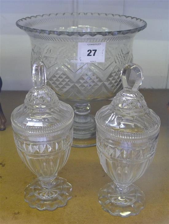 Waterford cut glass pedestal bowl and a pair of lidded vases(-)